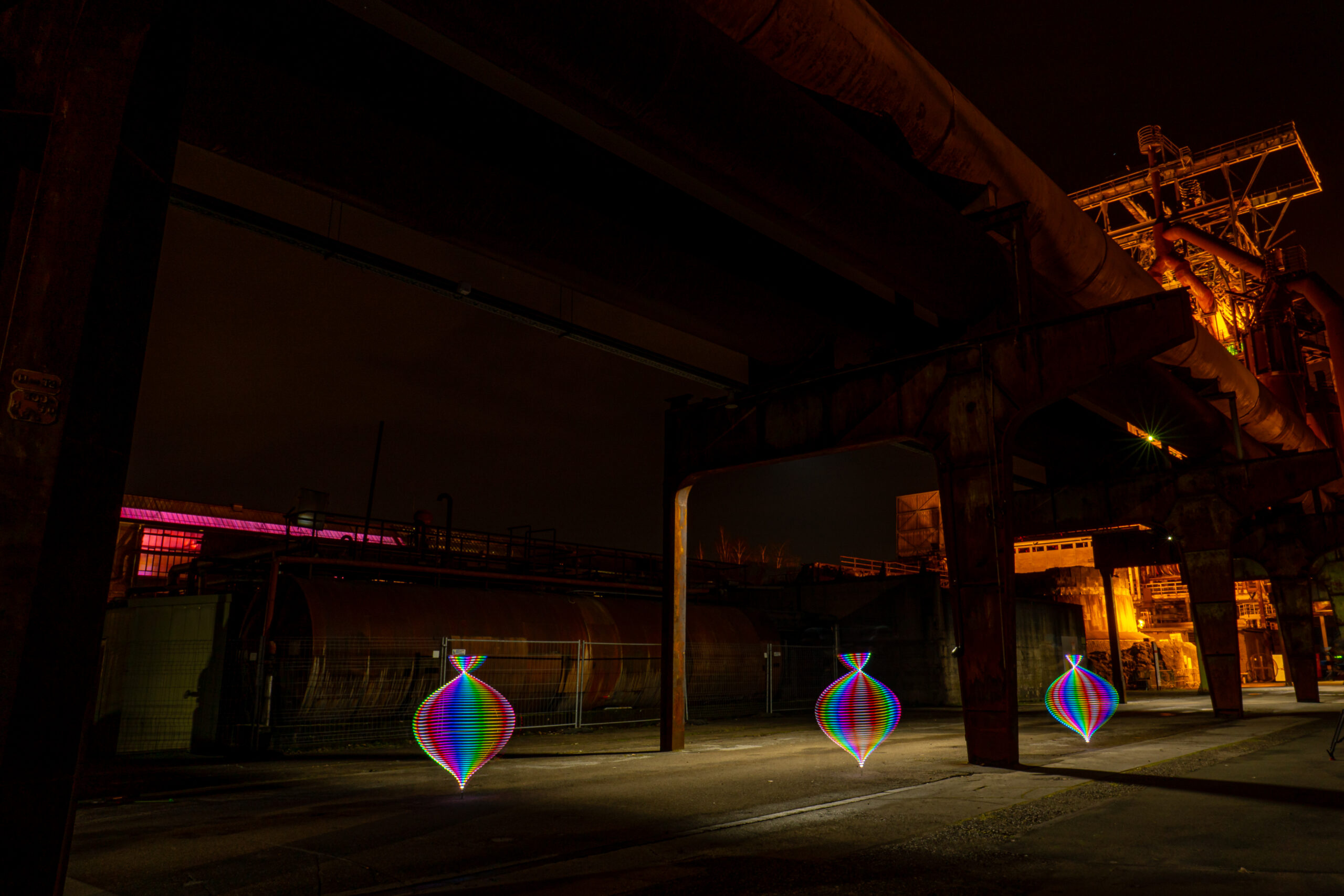 a group of lights on a street